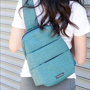 Fitkicks latitude adjustable sling bag (teal)